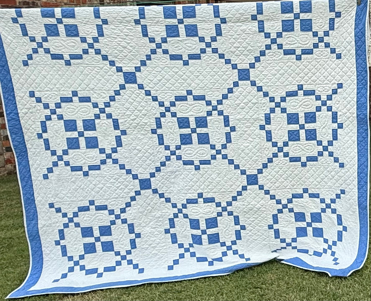 Blue And White Burgoyne Surrounded Quilt