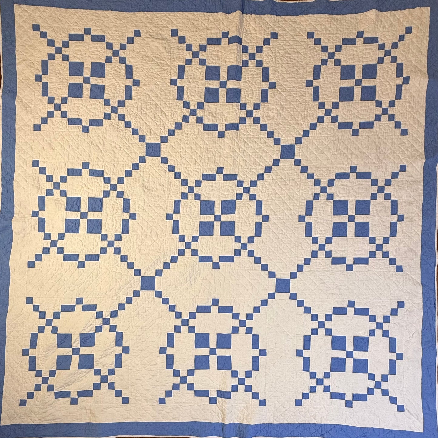 Blue And White Burgoyne Surrounded Quilt