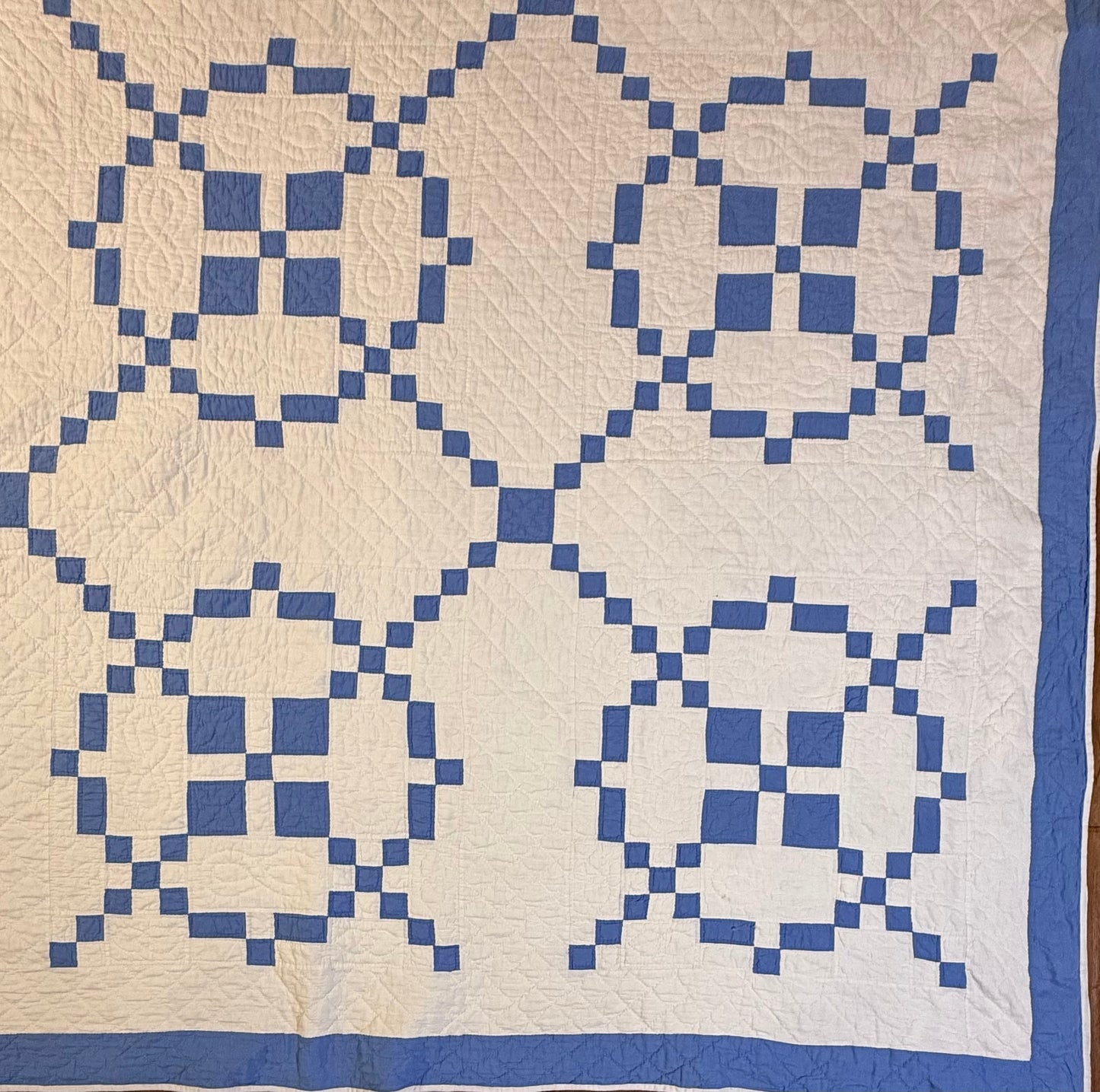 Blue And White Burgoyne Surrounded Quilt
