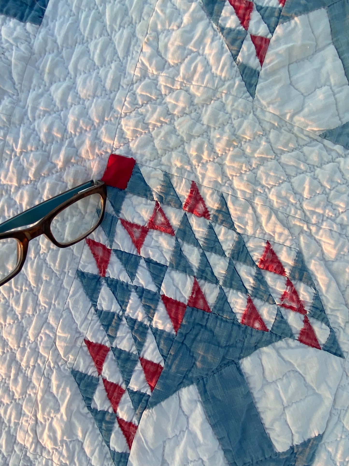 Pointing out the replaced red piece. Actually looks pretty good.
