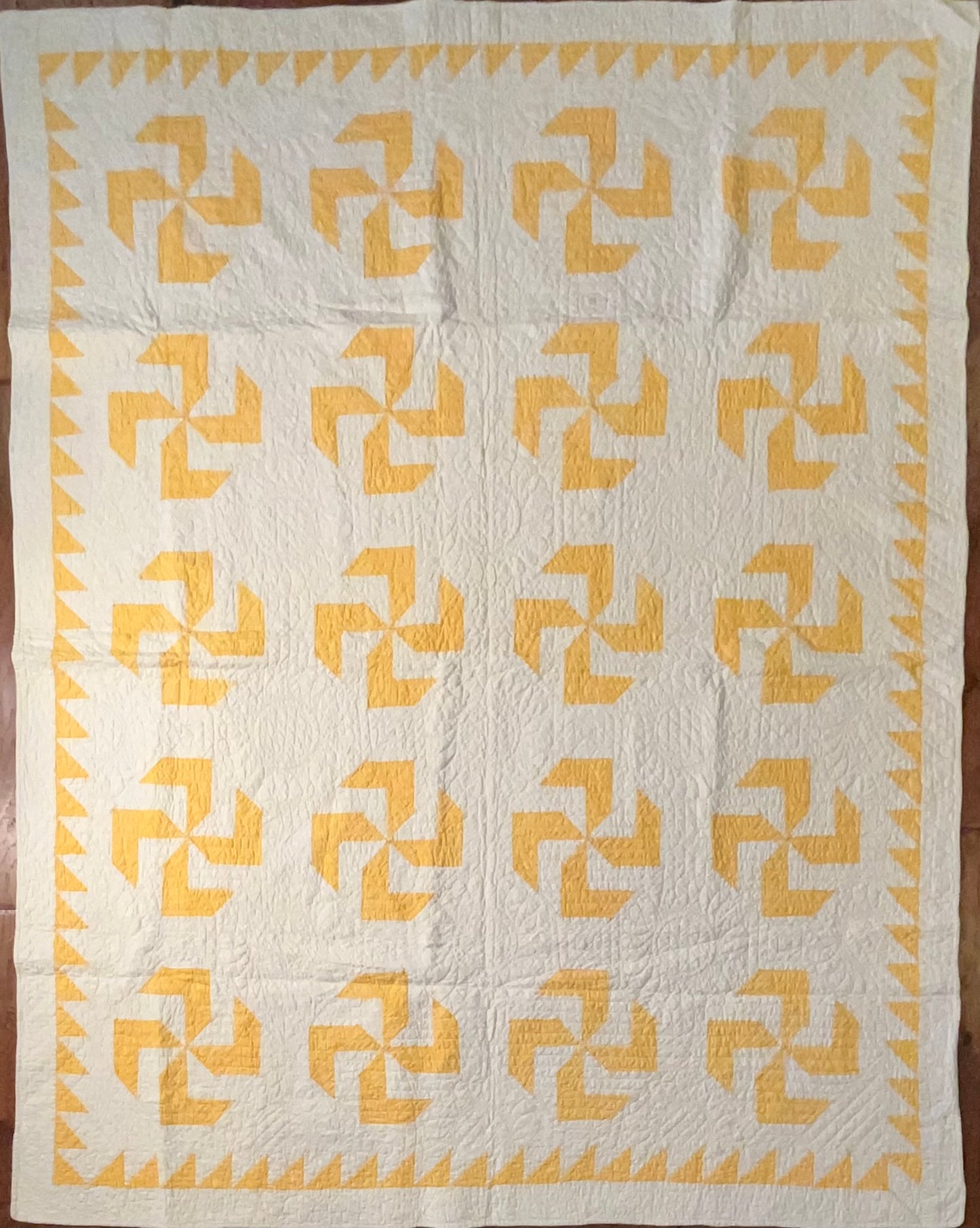 Flyfoot Quilt with Sawtooth Border