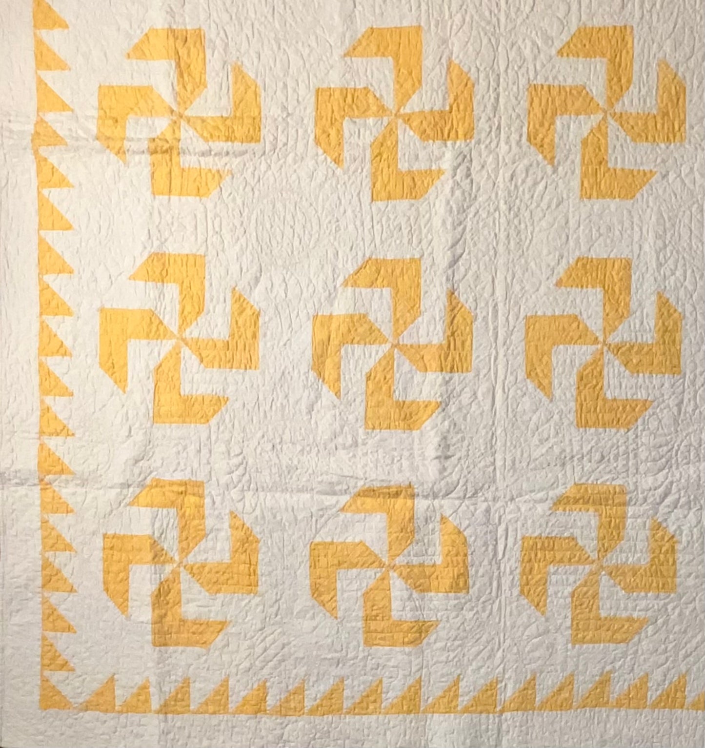 Flyfoot Quilt with Sawtooth Border