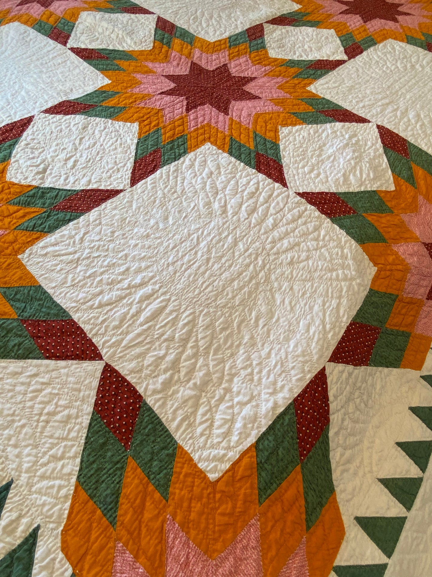 Touching 8 Point Stars Quilt with Sawtooth Border