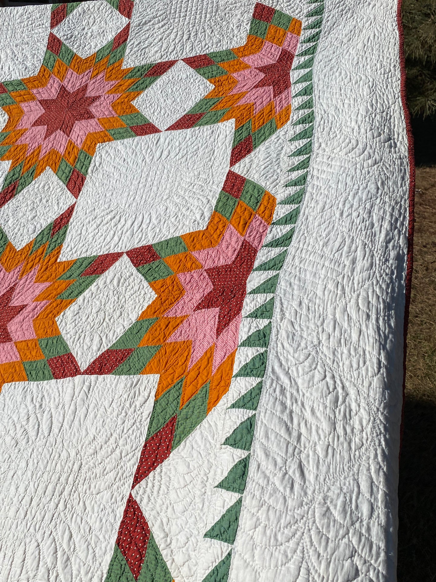 Touching 8 Point Stars Quilt with Sawtooth Border