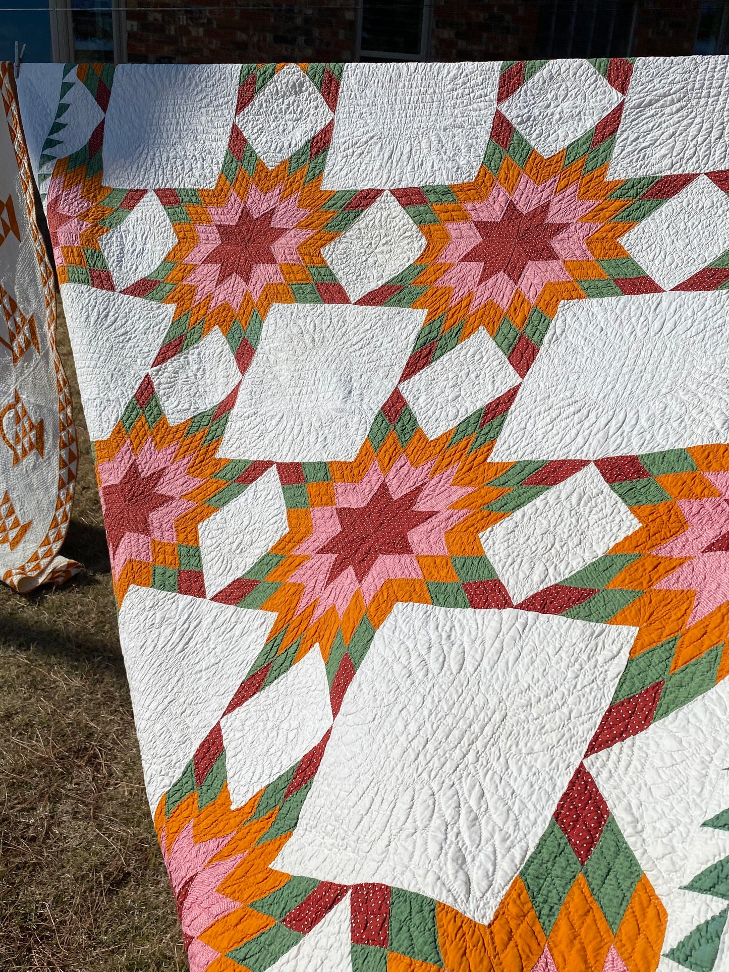 Touching 8 Point Stars Quilt with Sawtooth Border
