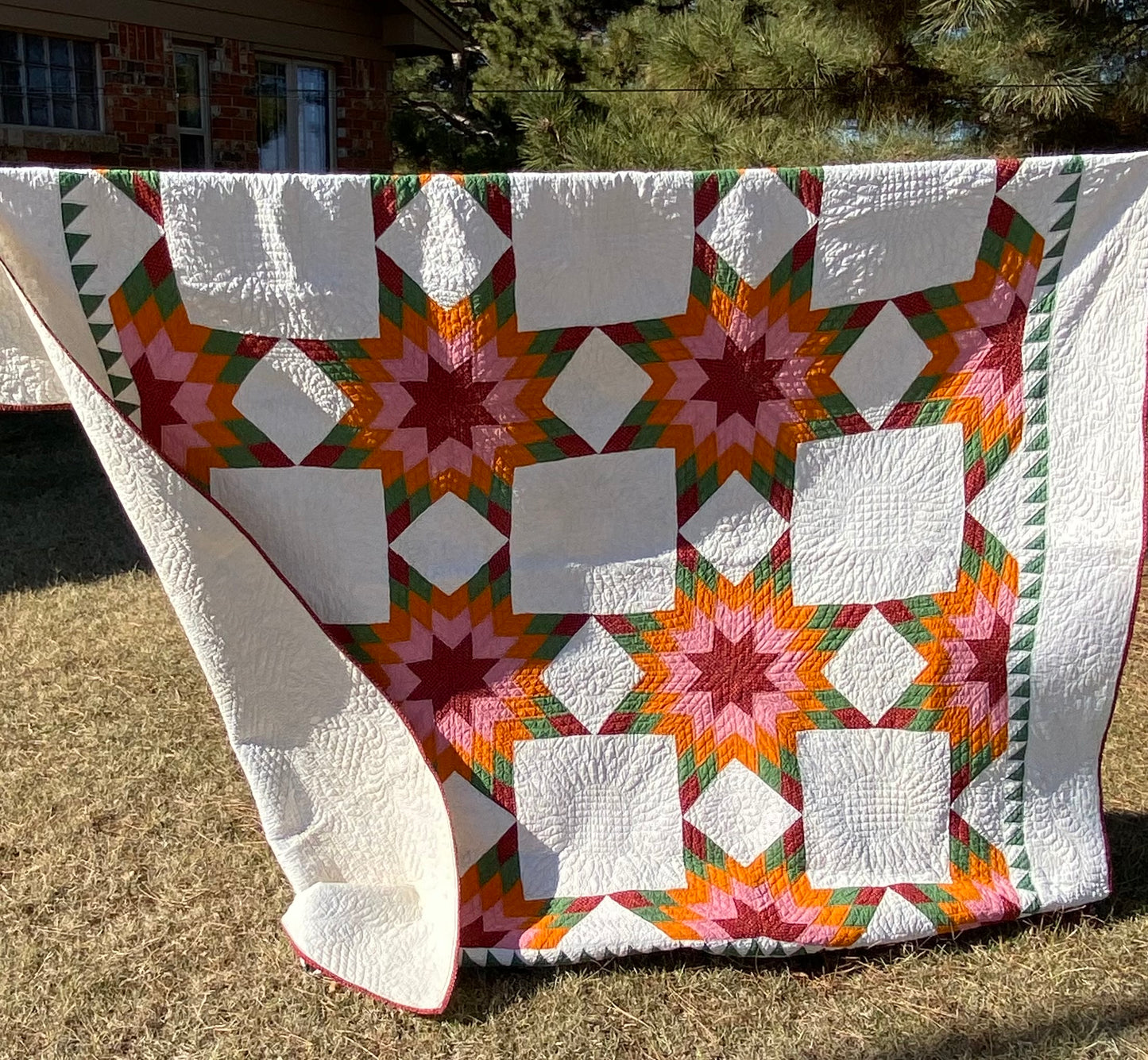 Touching 8 Point Stars Quilt with Sawtooth Border
