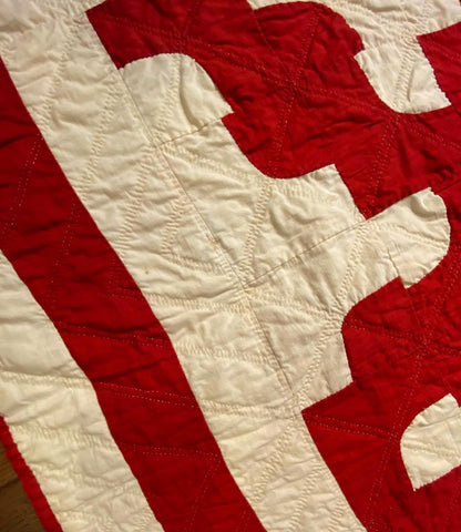 Red and White Drunkards Path Quilt