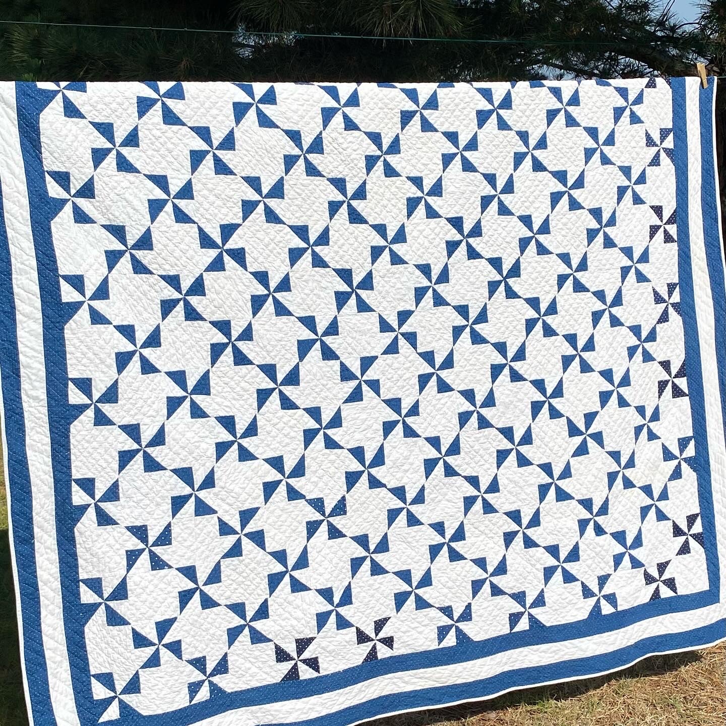 Indigo Pinwheels Quilt. Sold