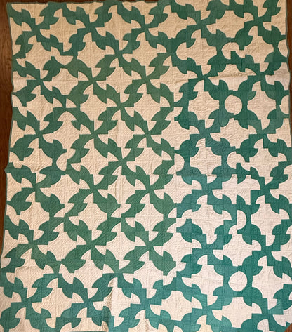 Green and White Drunkards Path Quilt