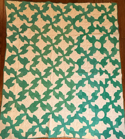 Green and White Drunkards Path Quilt