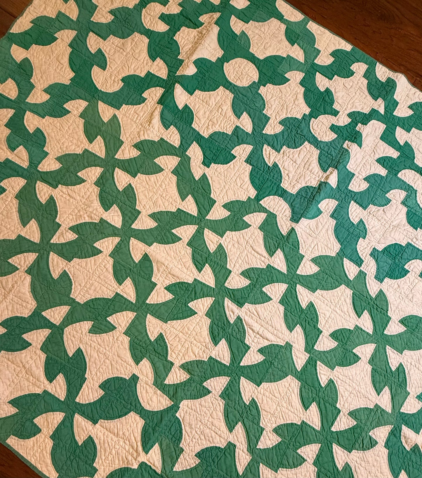 Green and White Drunkards Path Quilt