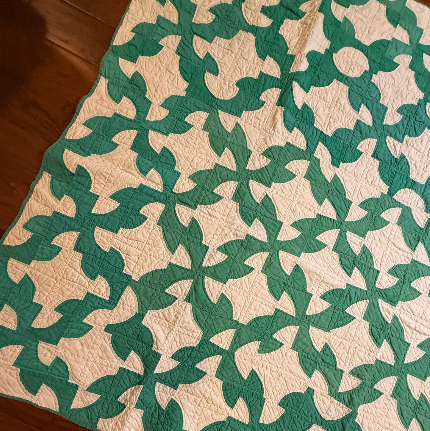 Green and White Drunkards Path Quilt