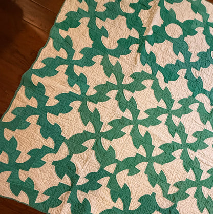 Green and White Drunkards Path Quilt