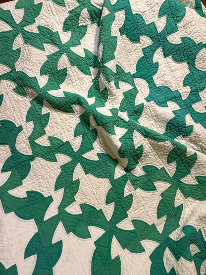 Green and White Drunkards Path Quilt