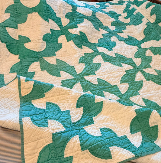 Green and White Drunkards Path Quilt