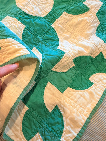 Green and White Drunkards Path Quilt