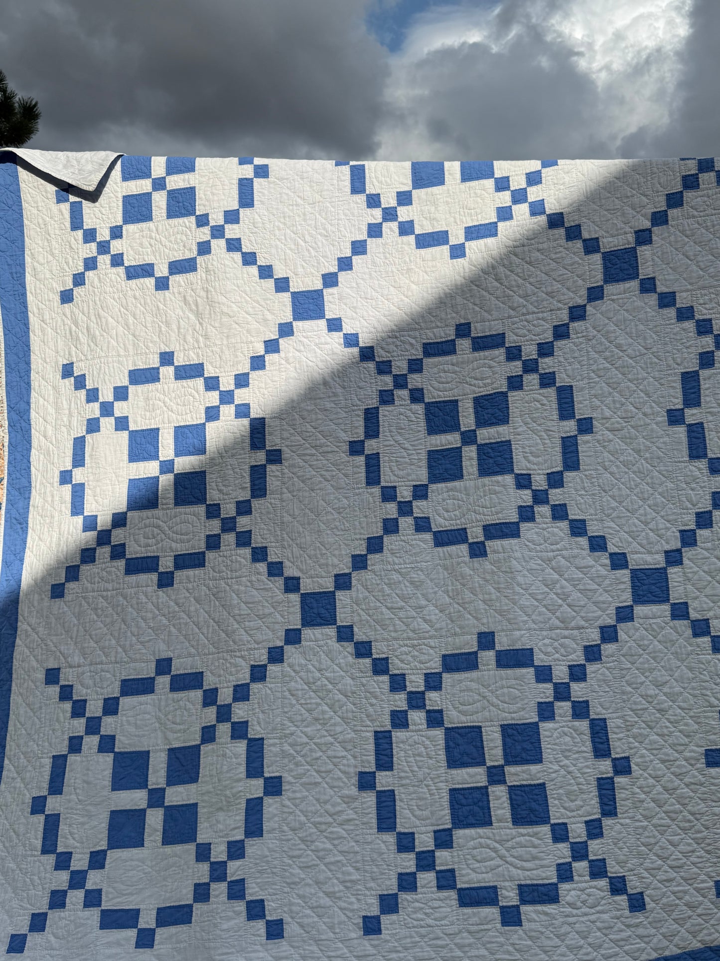Blue And White Burgoyne Surrounded Quilt