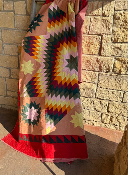 Blazing Star with Satellite Stars Quilt with a  Sawtooth Border