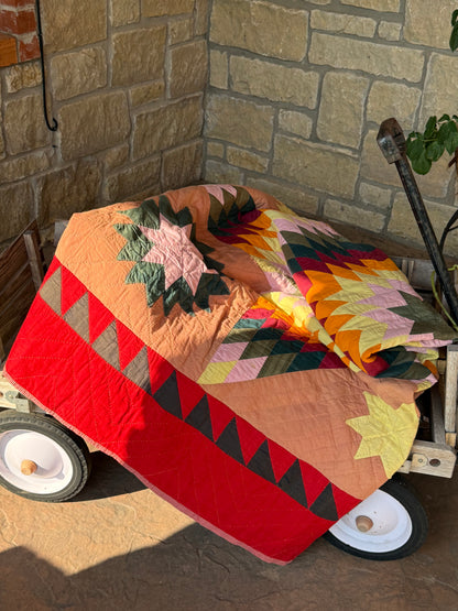 Blazing Star with Satellite Stars Quilt with a  Sawtooth Border