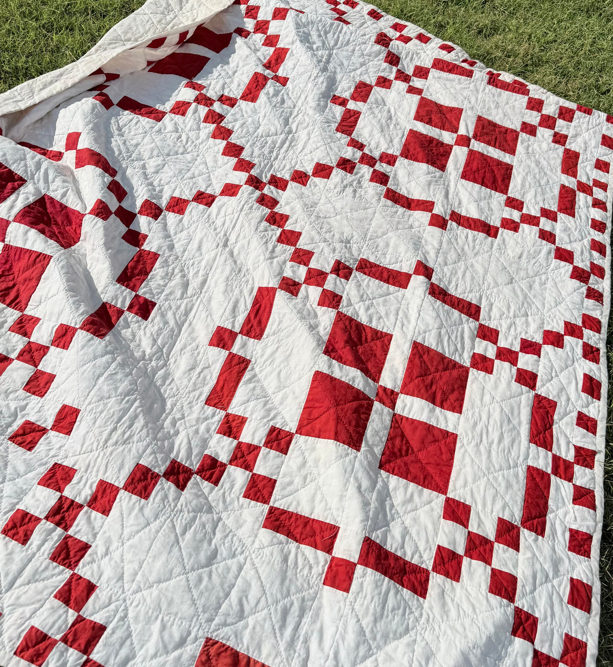 Red and White Burgoyne Surrounded Quilt With Blocks Border