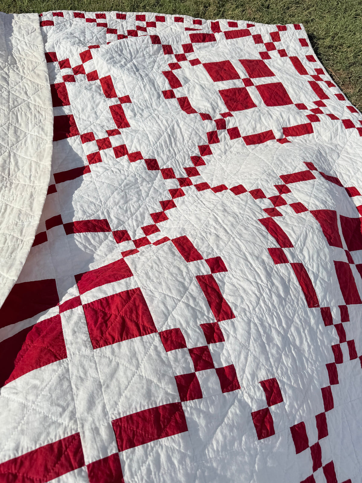 Red and White Burgoyne Surrounded Quilt With Blocks Border