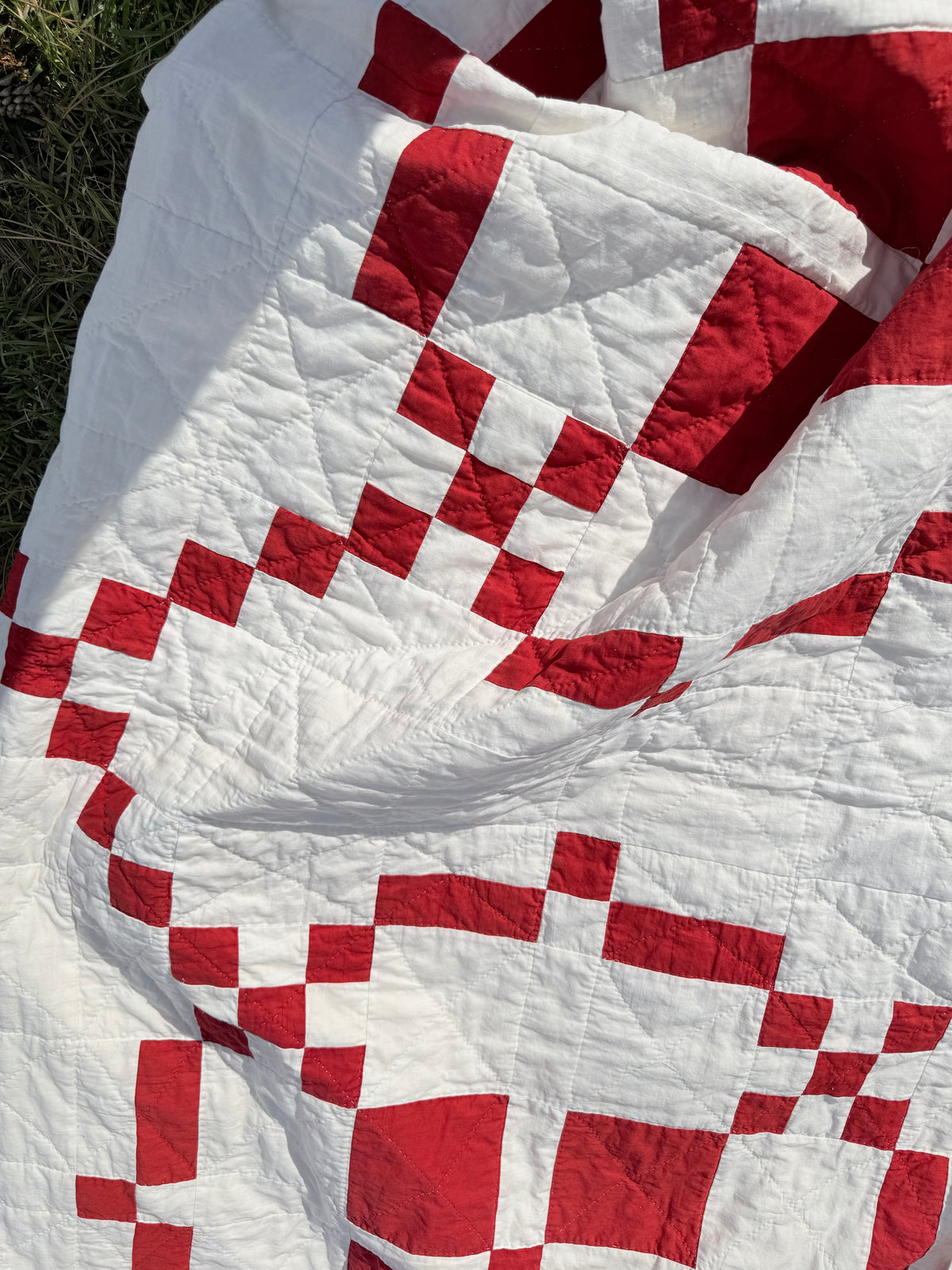 Red and White Burgoyne Surrounded Quilt With Blocks Border