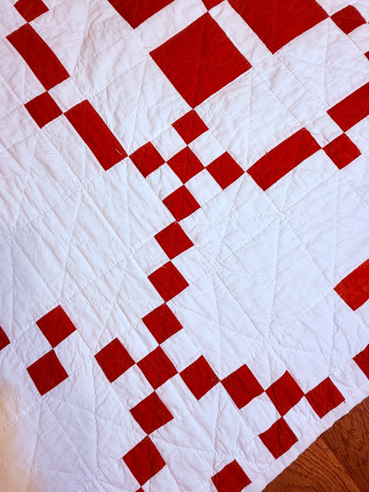 Red and White Burgoyne Surrounded Quilt With Blocks Border