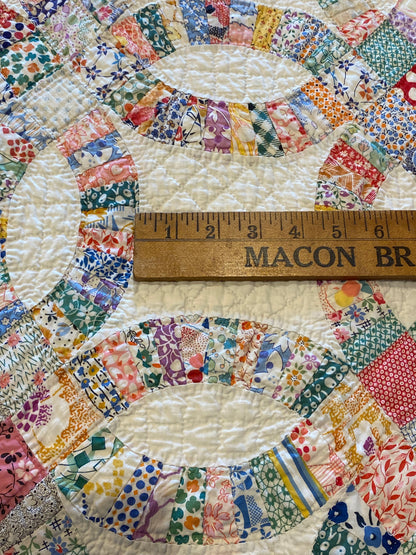 Small Scale Double Wedding Ring Quilt with a Double Bars Border