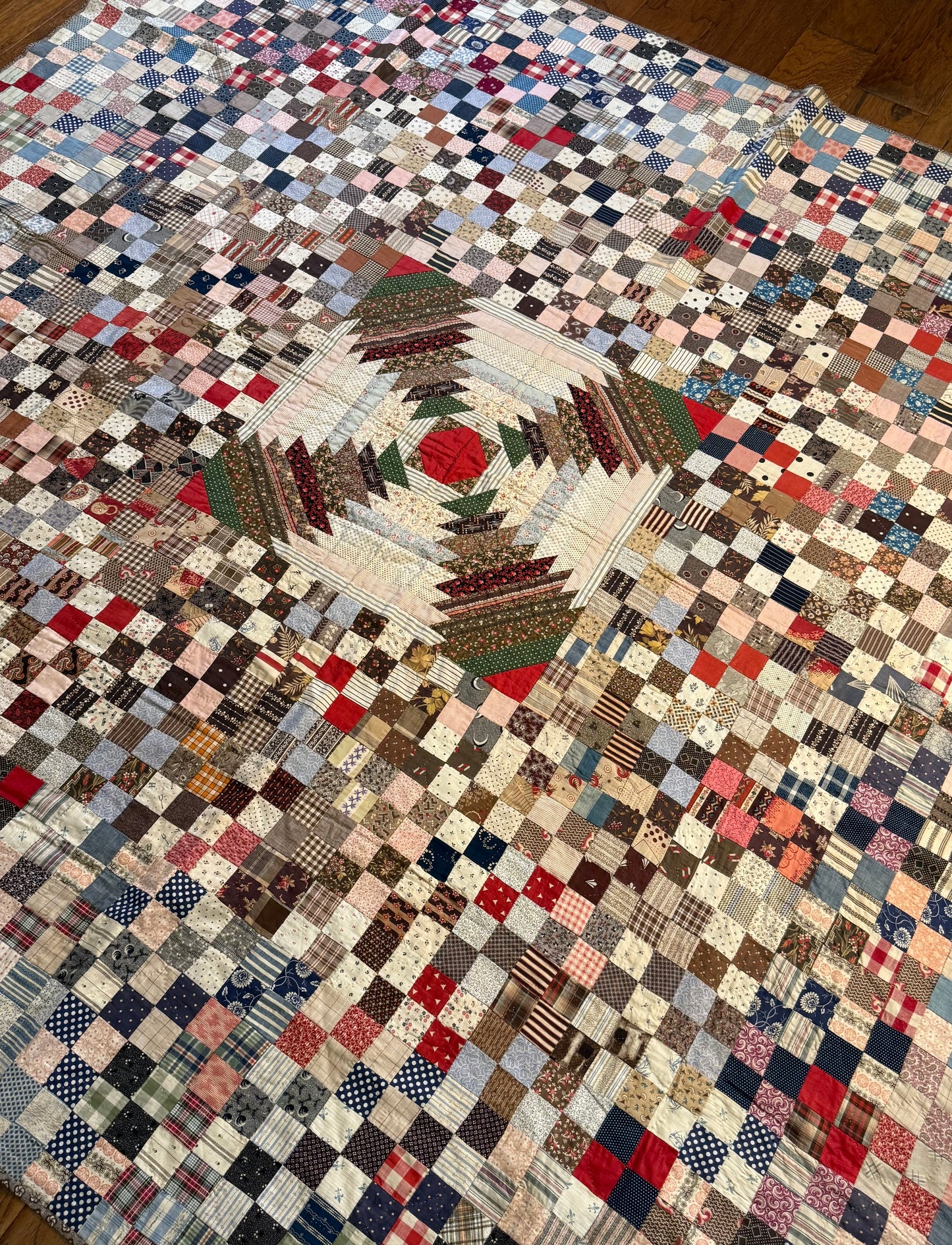 Pineapple Windmill Blades Medallion with Patchwork Quilt