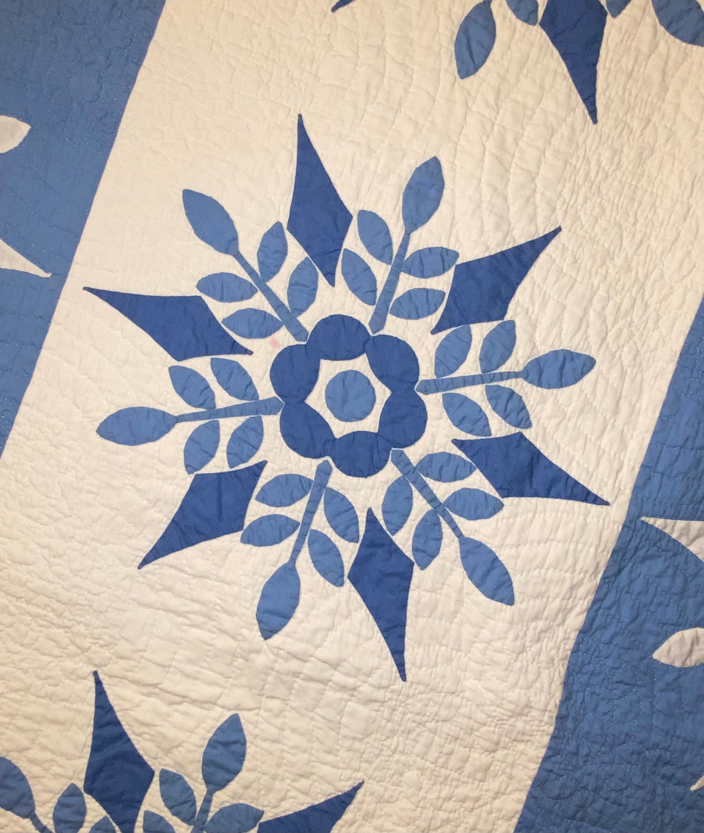 Blue and White Snowflake Quilt