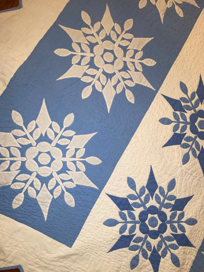 Blue and White Snowflake Quilt