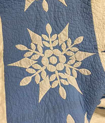 Blue and White Snowflake Quilt