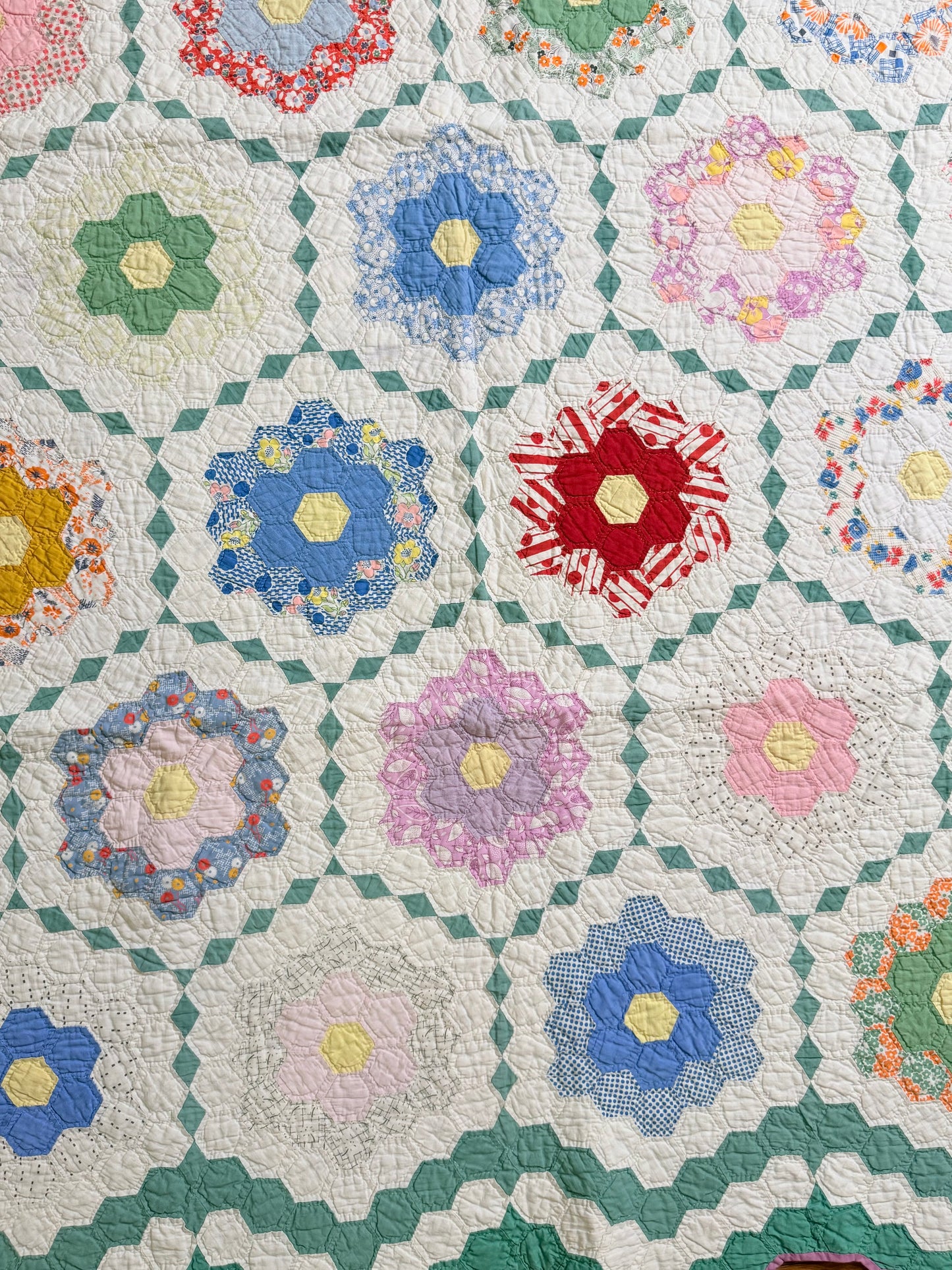 Flower Garden Quilt with Diamond Trail
