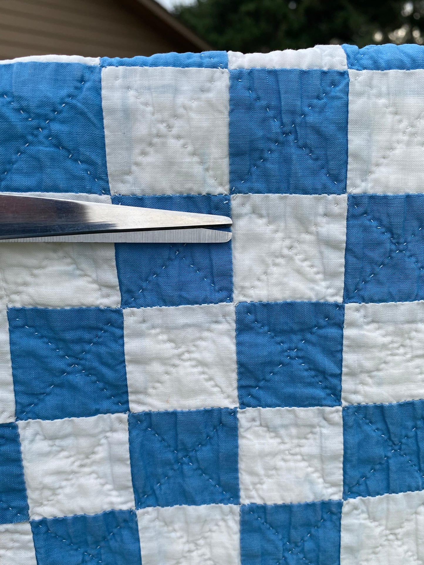 Blue and White Patchwork Irish Chain Quilt