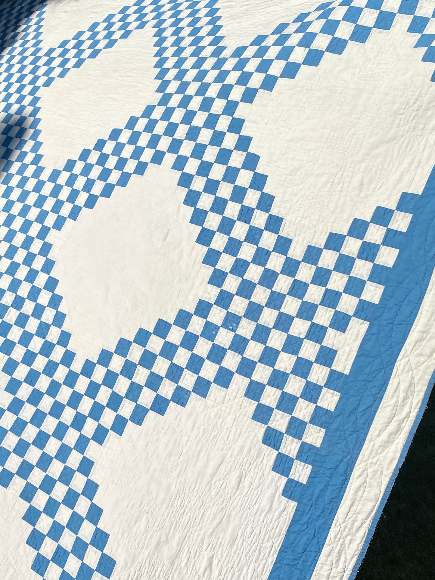 Blue and White Patchwork Irish Chain Quilt