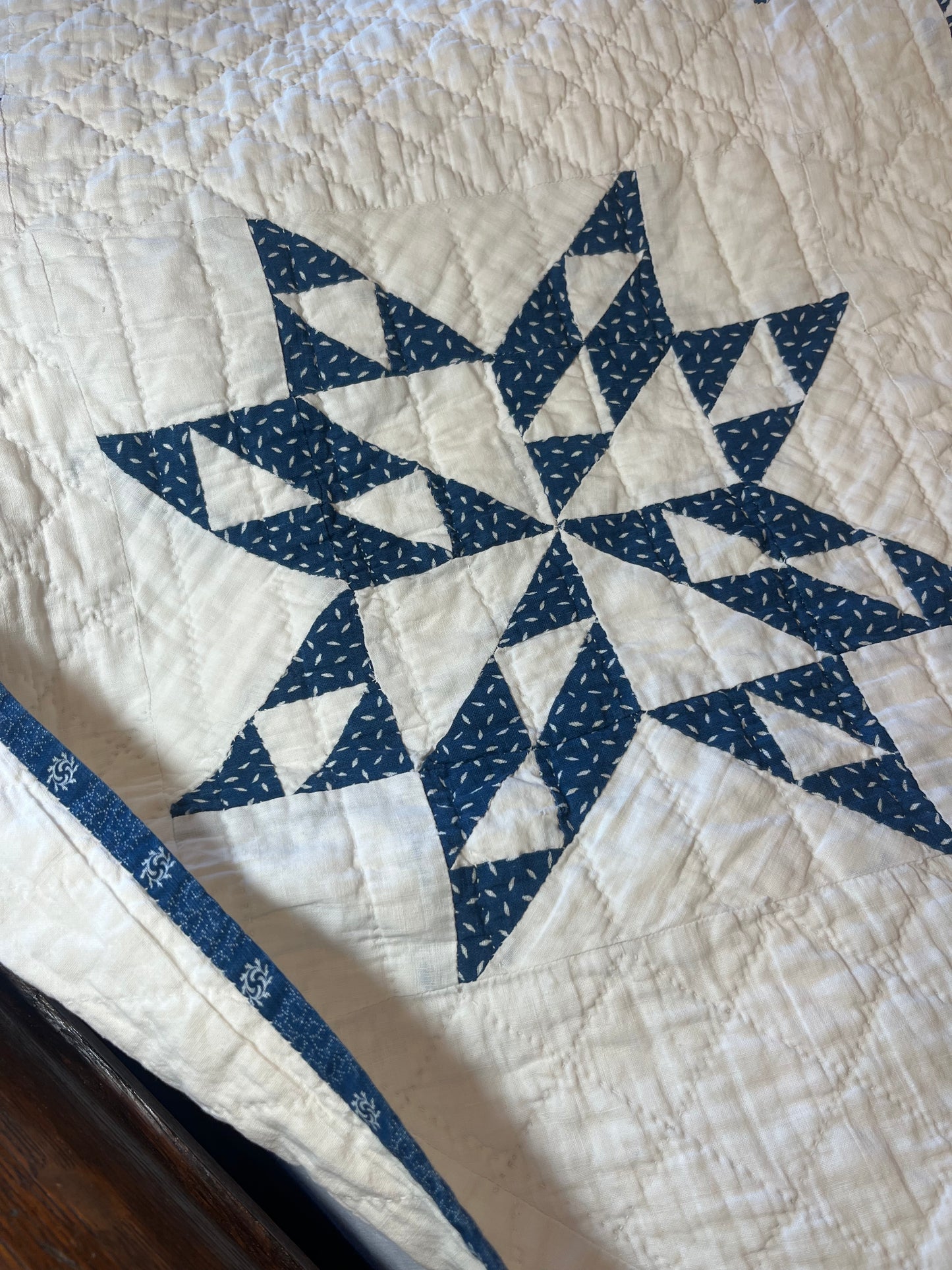 Blue and White Star of Triangles Quilt
