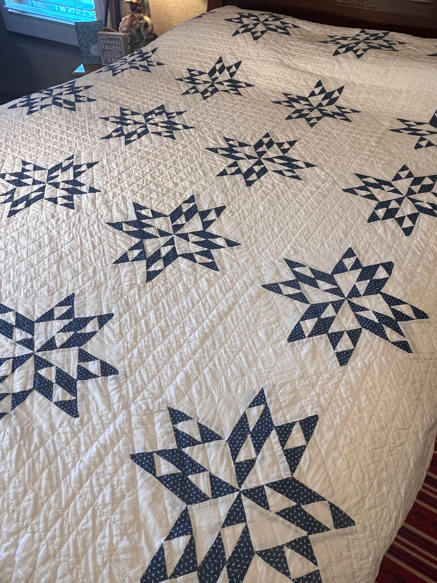 Blue and White Star of Triangles Quilt