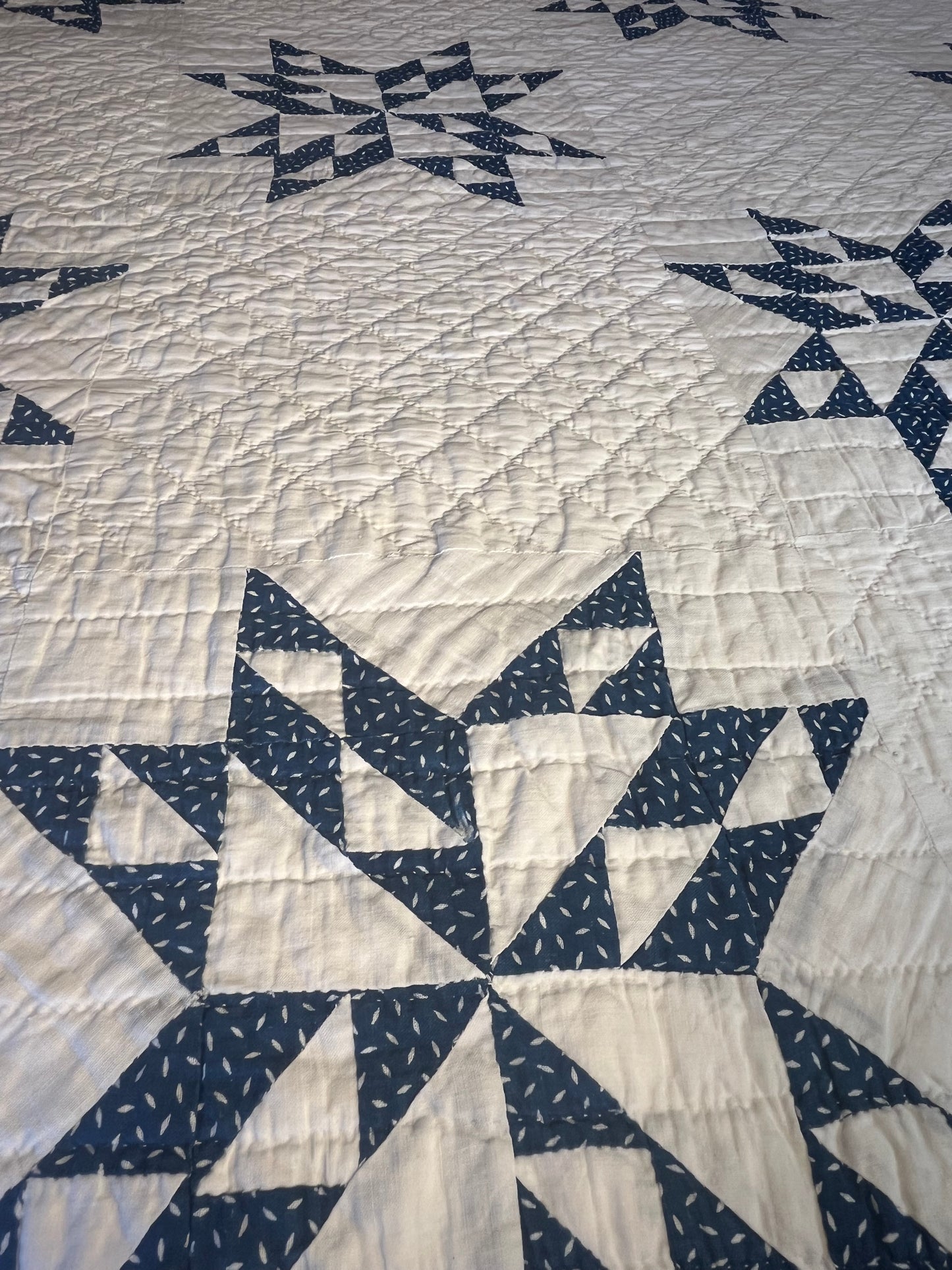 Blue and White Star of Triangles Quilt