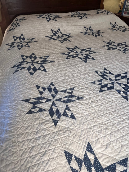 Blue and White Star of Triangles Quilt