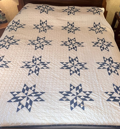 Blue and White Star of Triangles Quilt