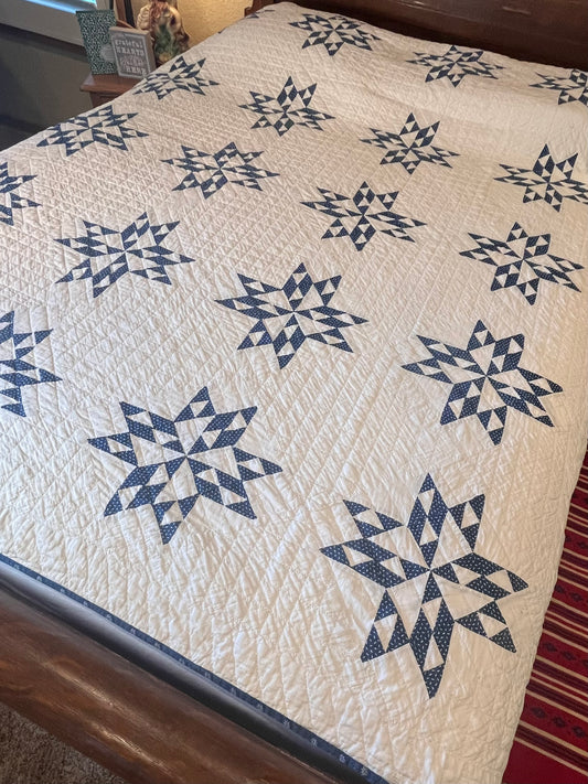 Blue and White Star of Triangles Quilt