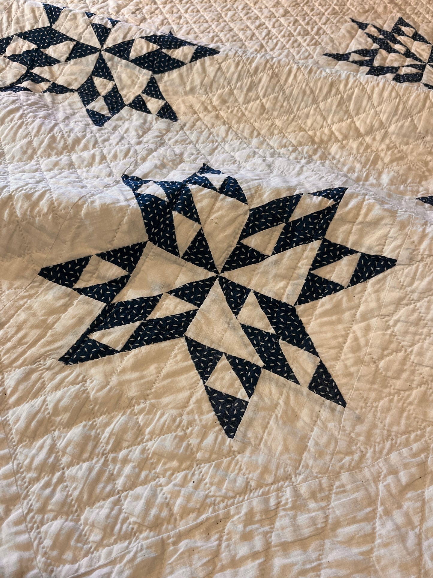 Blue and White Star of Triangles Quilt
