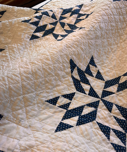 Blue and White Star of Triangles Quilt