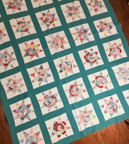 Colorful Scrappy String Stars Quilt