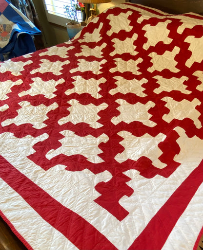 Red and White Drunkards Path Quilt