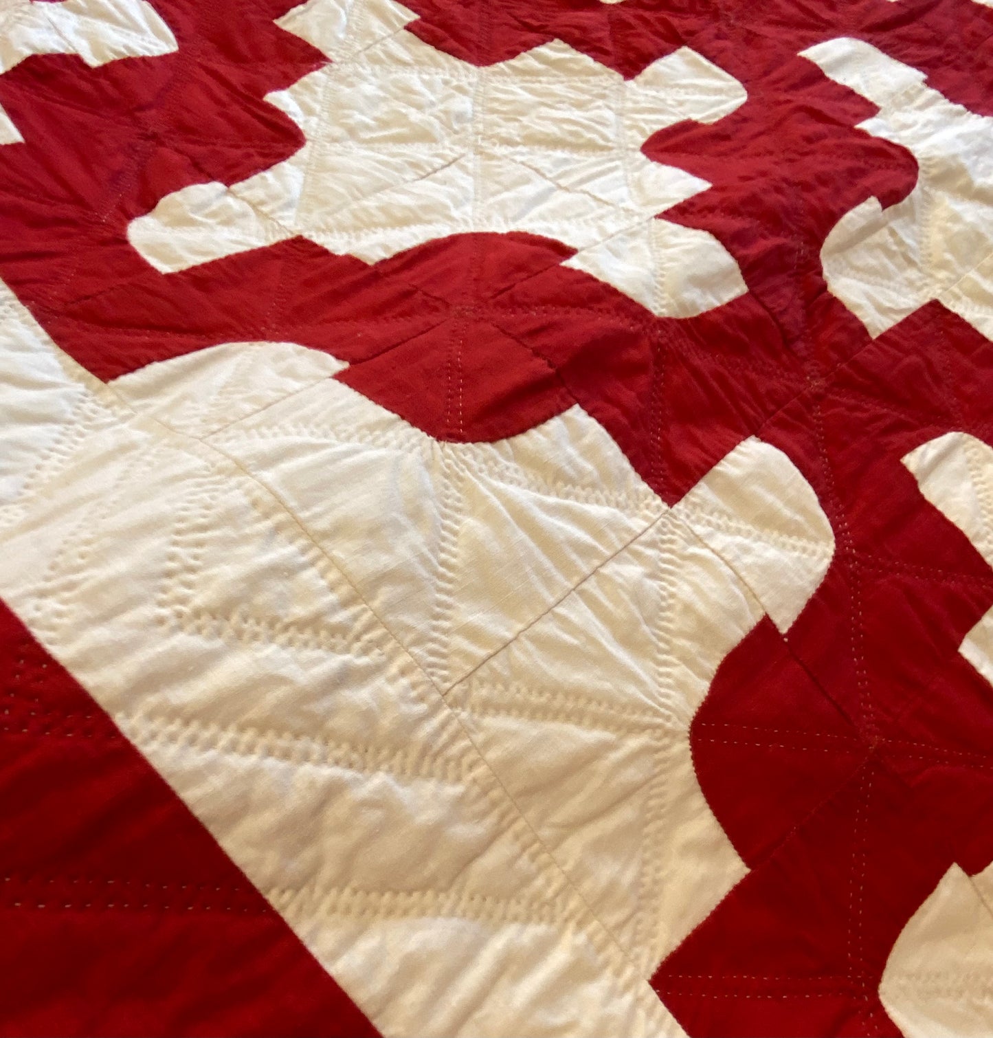 Red and White Drunkards Path Quilt