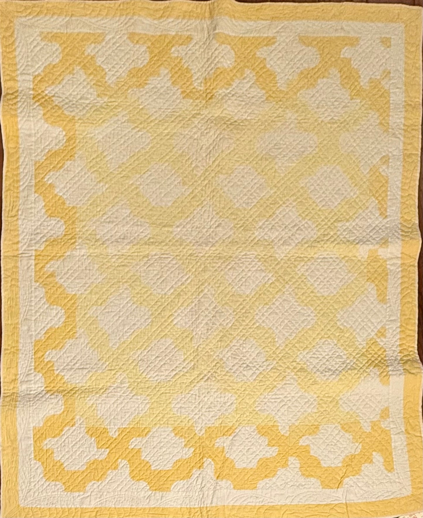 Yellow and White Drunkards Path Crib Quilti