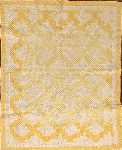 Yellow and White Drunkards Path Crib Quilti