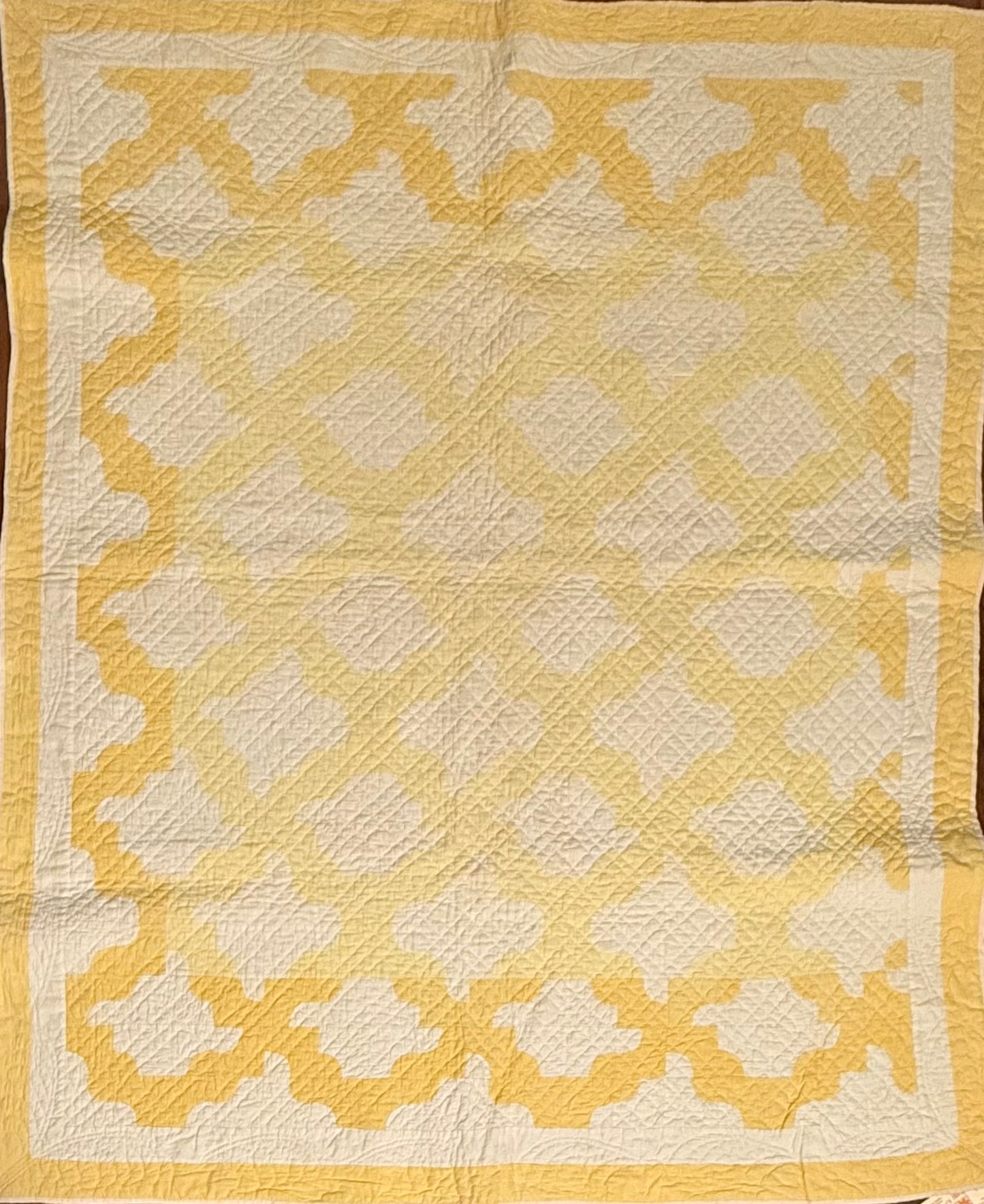 Yellow and White Drunkards Path Crib Quilti