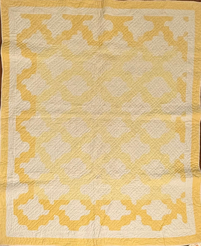 Yellow and White Drunkards Path Crib Quilti